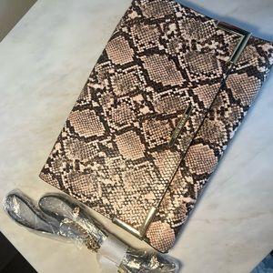 Steve Madden snake print clutch. Worn once